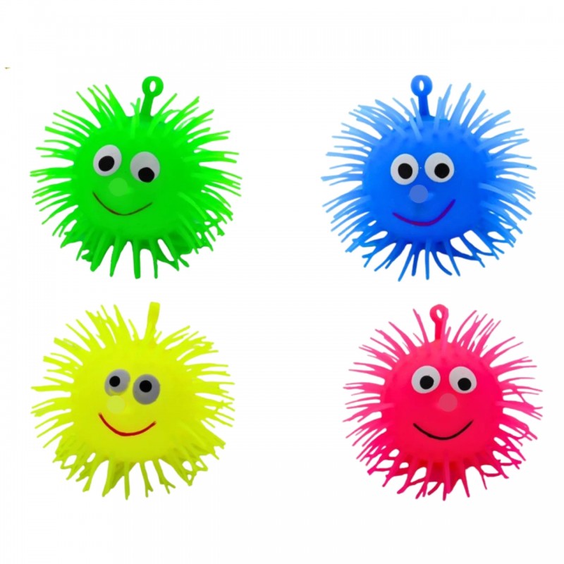 Pelotas antiestrés con púas de colores verde, azul, rosa y amarillo.