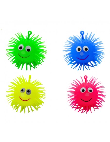 Pelotas antiestrés con púas de colores verde, azul, rosa y amarillo.