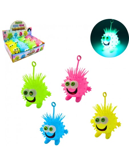 Pelota antiestrés luminosa con ojos grandes y púas en varios colores.