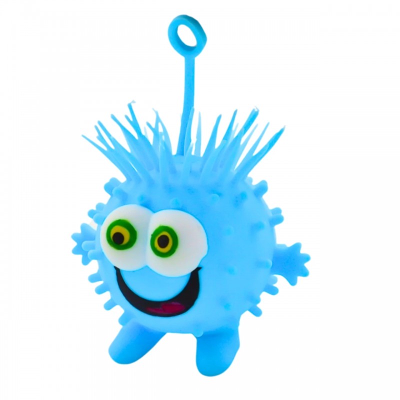 Pelota elástica azul con cara de monstruo y anillo de sujeción elástico.