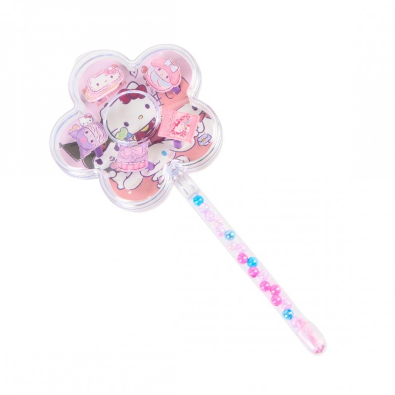 Estuche transparente en forma de varita de flor con cuentas de colores del set de bisutería Hello Kitty.