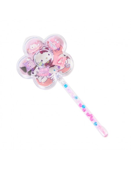 Estuche transparente en forma de varita de flor con cuentas de colores del set de bisutería Hello Kitty.