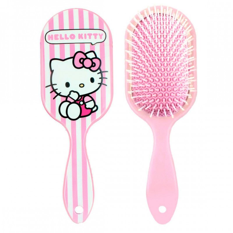 Vista frontal con diseño de Hello Kitty y trasera con cabezal acolchado de púas del cepillo de pelo infantil.