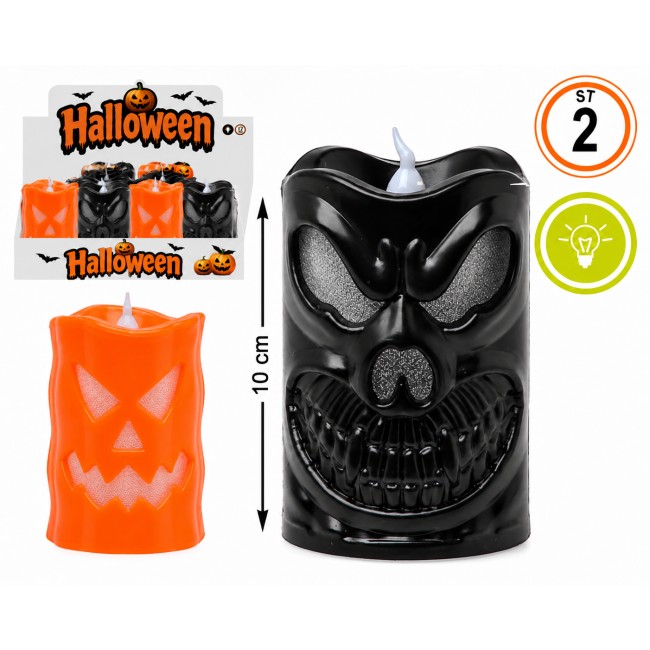 Vela LED de Halloween de 10 cm. con diseño de calavera en colores naranja y negro y luz superior.