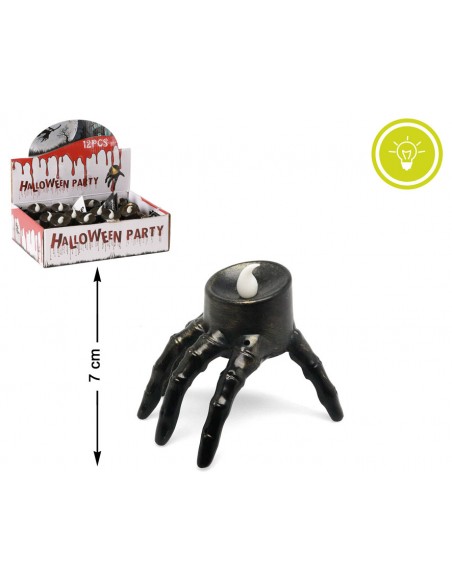 Vela LED de Halloween de 7 cm. con diseño de mano terrorífica oscura y luz superior.
