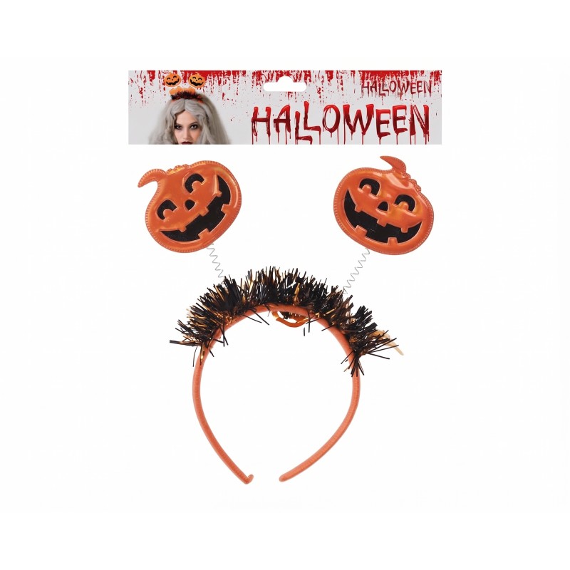 Diadema de Halloween con calabazas y muelles presentada en su empaque original.